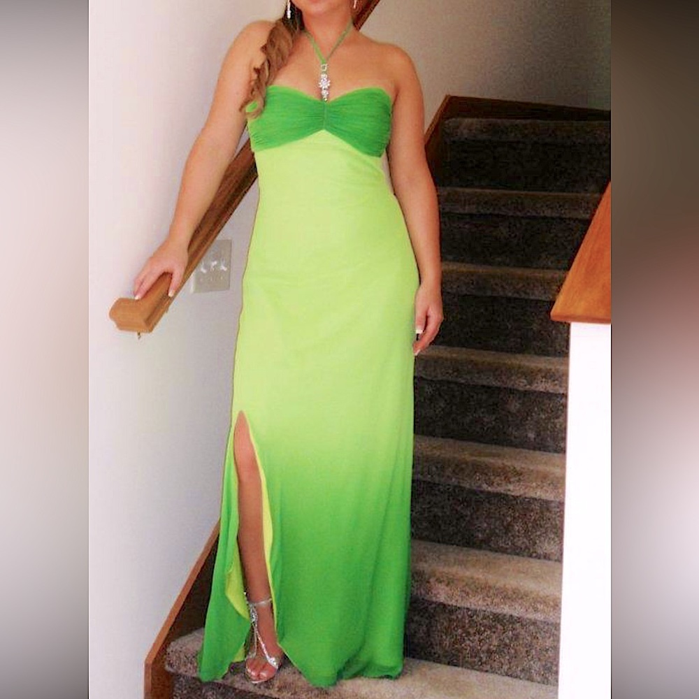 Green boutique formal gown. Size 6. Rhinestone accents.